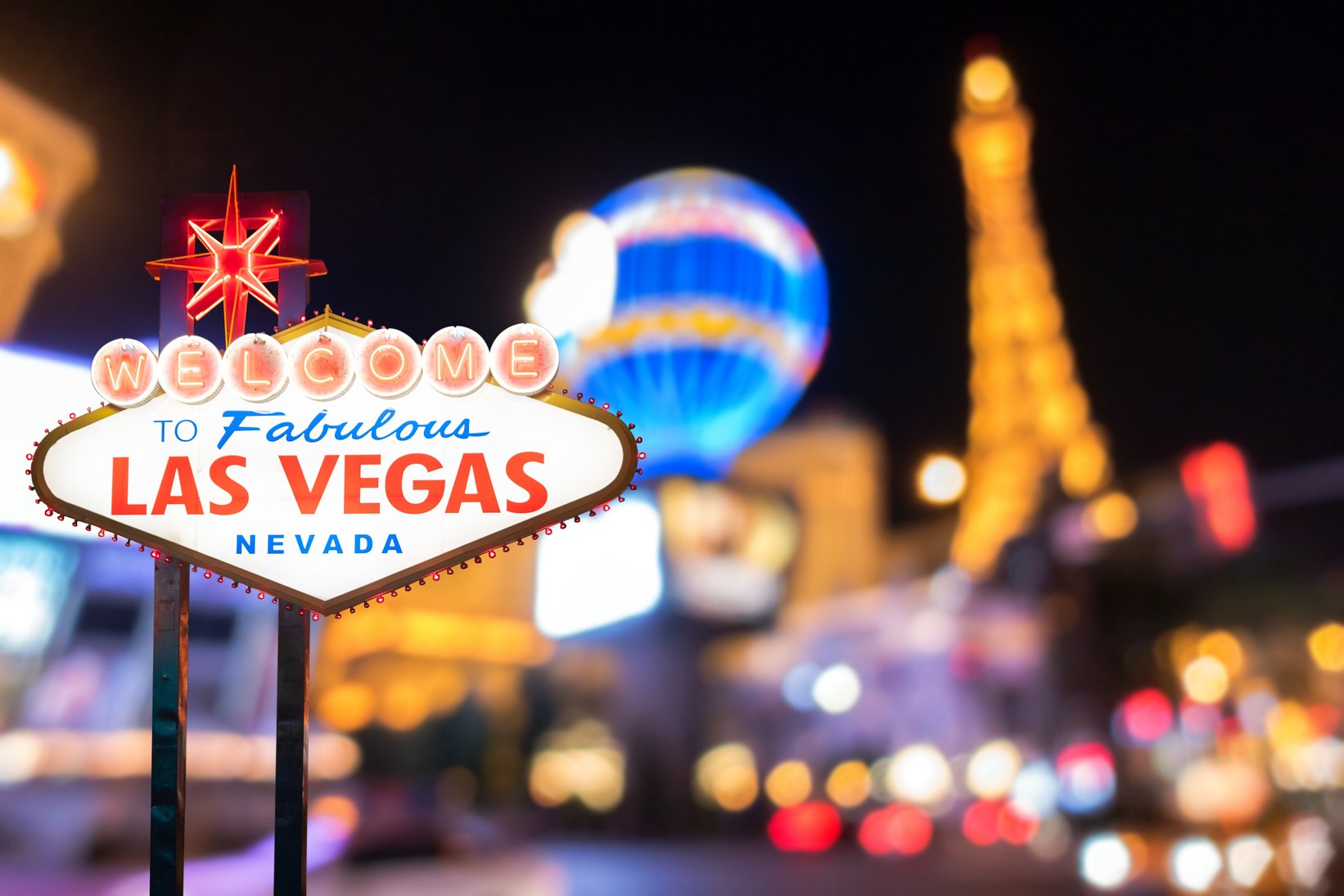 Famous Las Vegas sign with blur cityscape